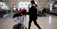 الصين تعفي المسافرين من اختبار كشف كورونا
