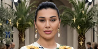نادين الراسي تحبس دموعها وهي تغني لشقيقها جورج